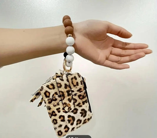 Leopard printed beaded wallet key chain.